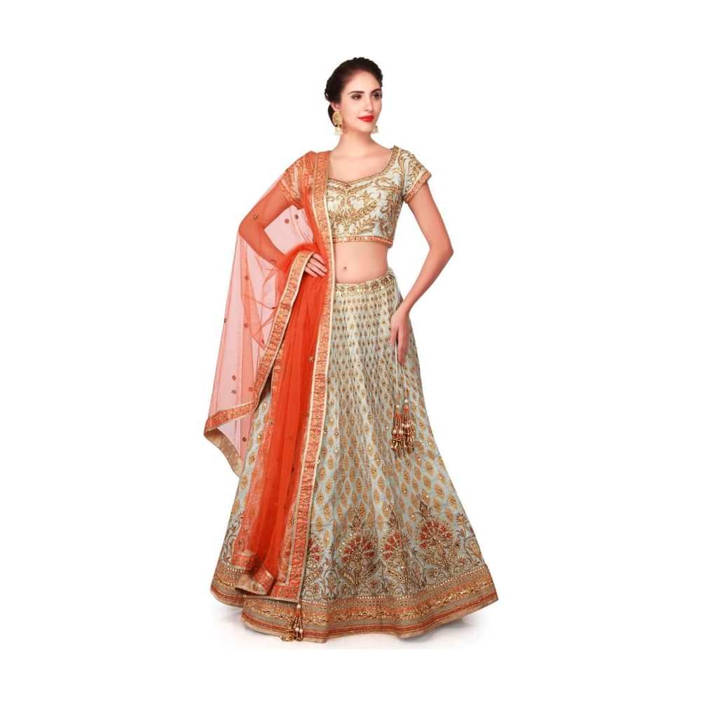 Mint blue lehenga in raw silk enhanced in zari patchwork embroidery only on Kalki