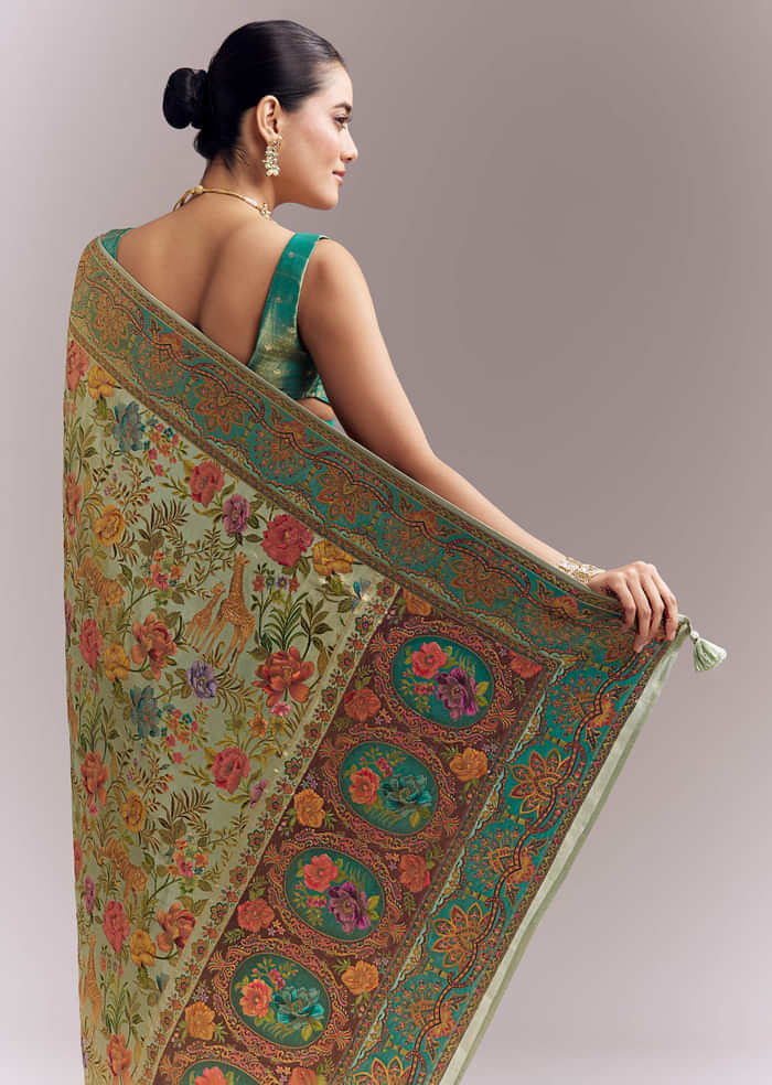 Mint Green Dola Silk Woven Saree With Embroidered Nature Motifs