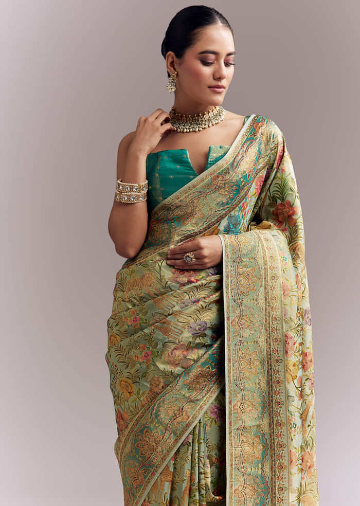 Mint Green Dola Silk Woven Saree With Embroidered Nature Motifs