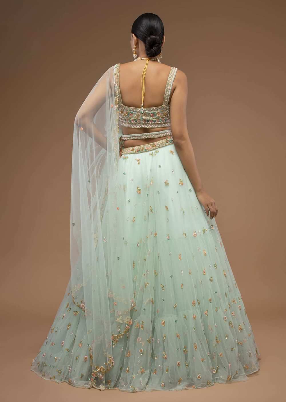 Mint Lehenga And A Crop Top Set Crafted In Net With Sequins And Resham Work