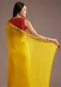 Mustard Yellow Crepe Silk Saree With Zari Border And Contrast Blouse