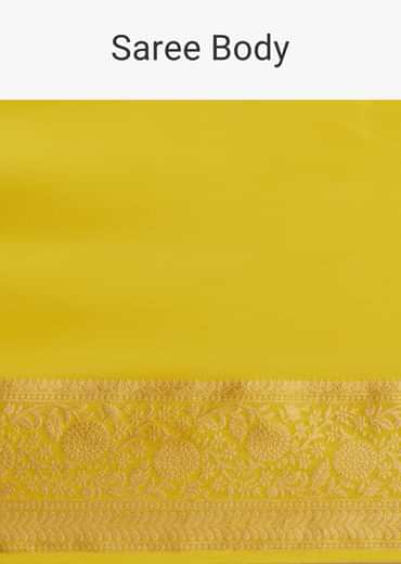 Mustard Yellow Crepe Silk Saree With Zari Border And Contrast Blouse