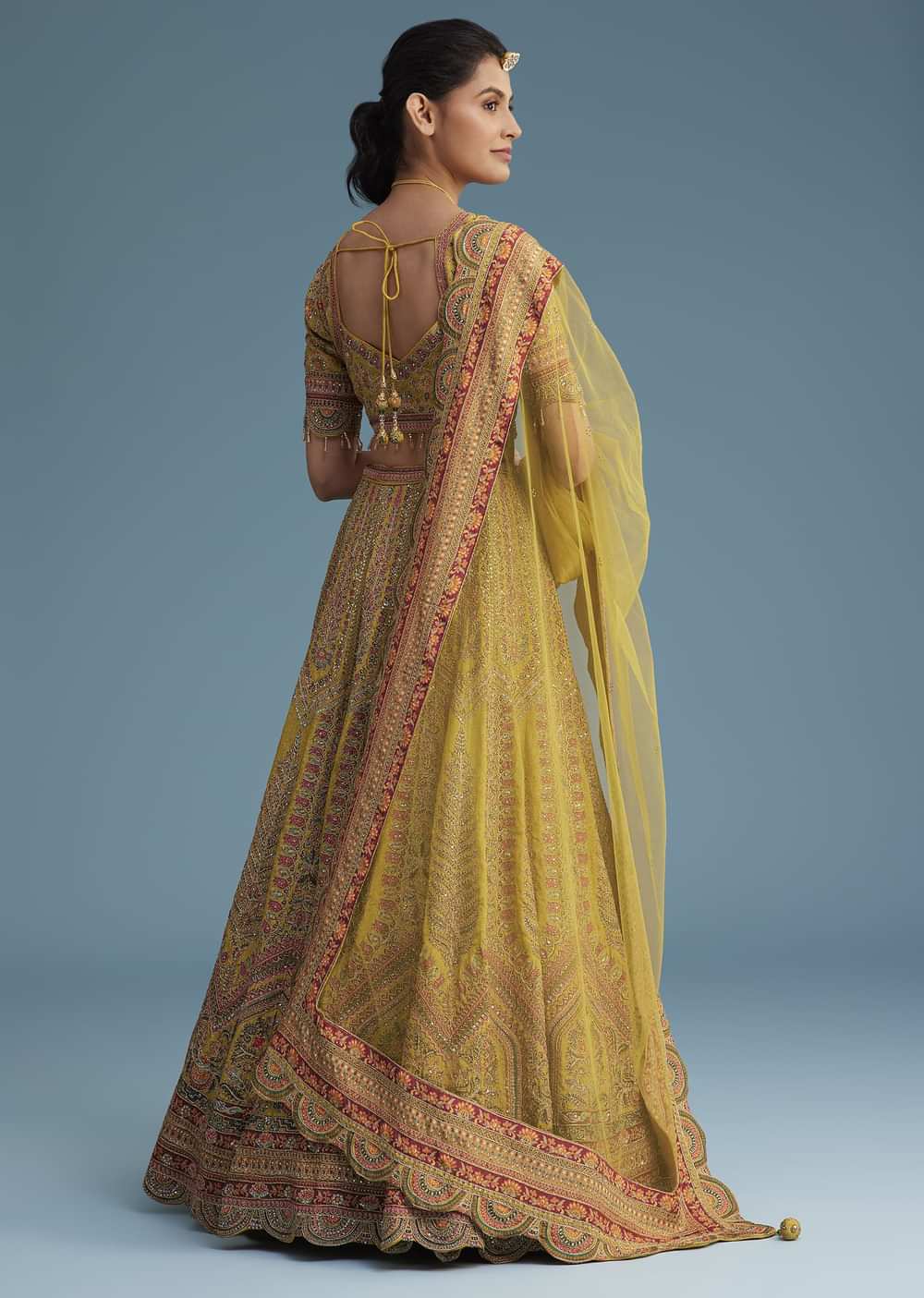 Mustard Crepe Lehenga Set With Floral Motif And Embroidery