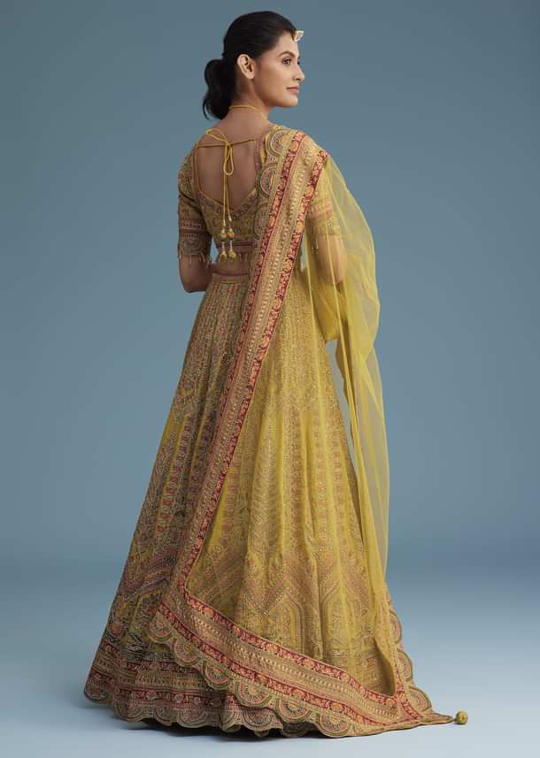 Mustard Crepe Lehenga Set With Floral Motif And Embroidery