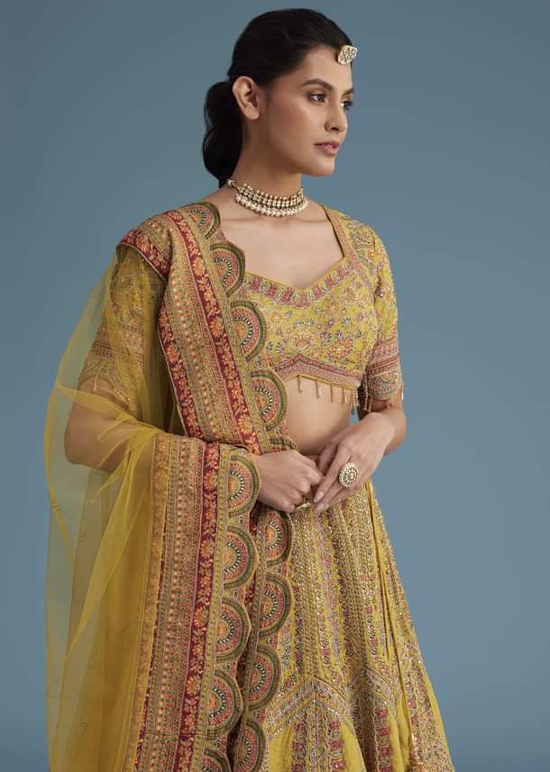 Mustard Crepe Lehenga Set With Floral Motif And Embroidery
