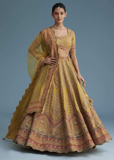 Mustard Crepe Lehenga Set With Floral Motif And Embroidery