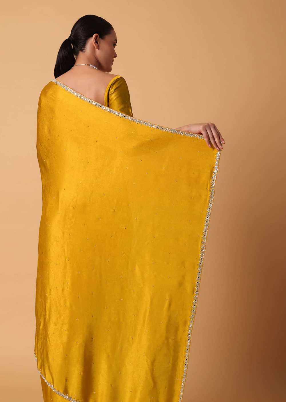 Mustard Satin Chinnon Saree With Mirror Detail Border And Unstitched Blouse Piece