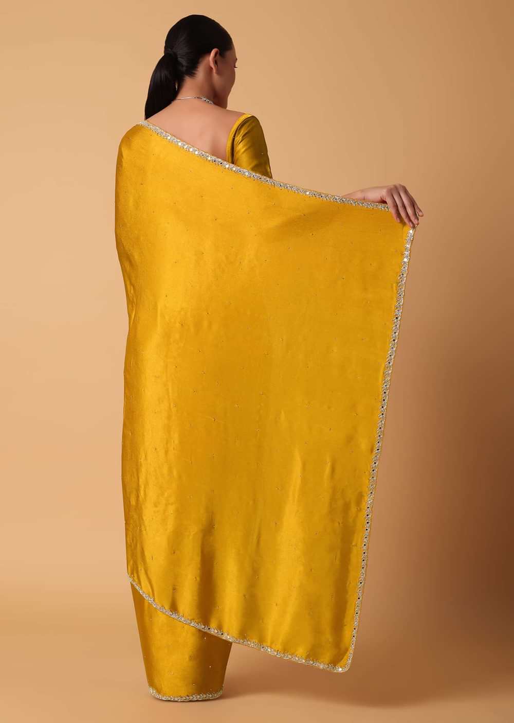 Mustard Satin Chinnon Saree With Mirror Detail Border And Unstitched Blouse Piece