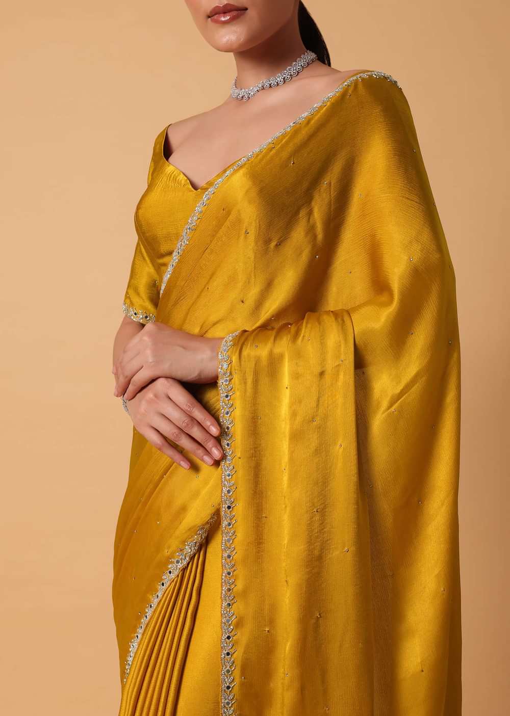 Mustard Satin Chinnon Saree With Mirror Detail Border And Unstitched Blouse Piece