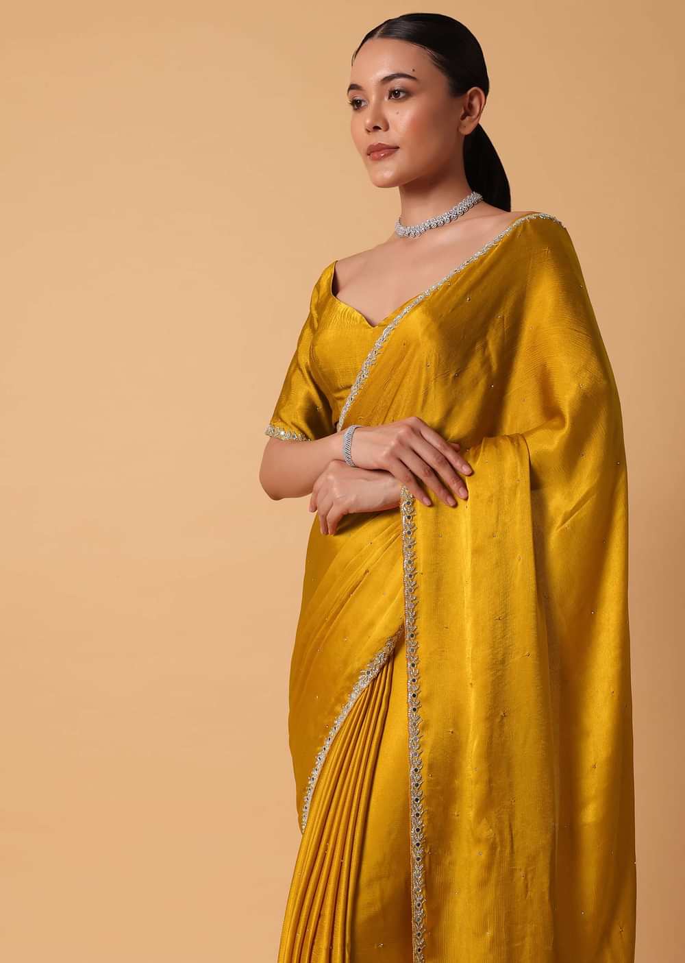Mustard Satin Chinnon Saree With Mirror Detail Border And Unstitched Blouse Piece