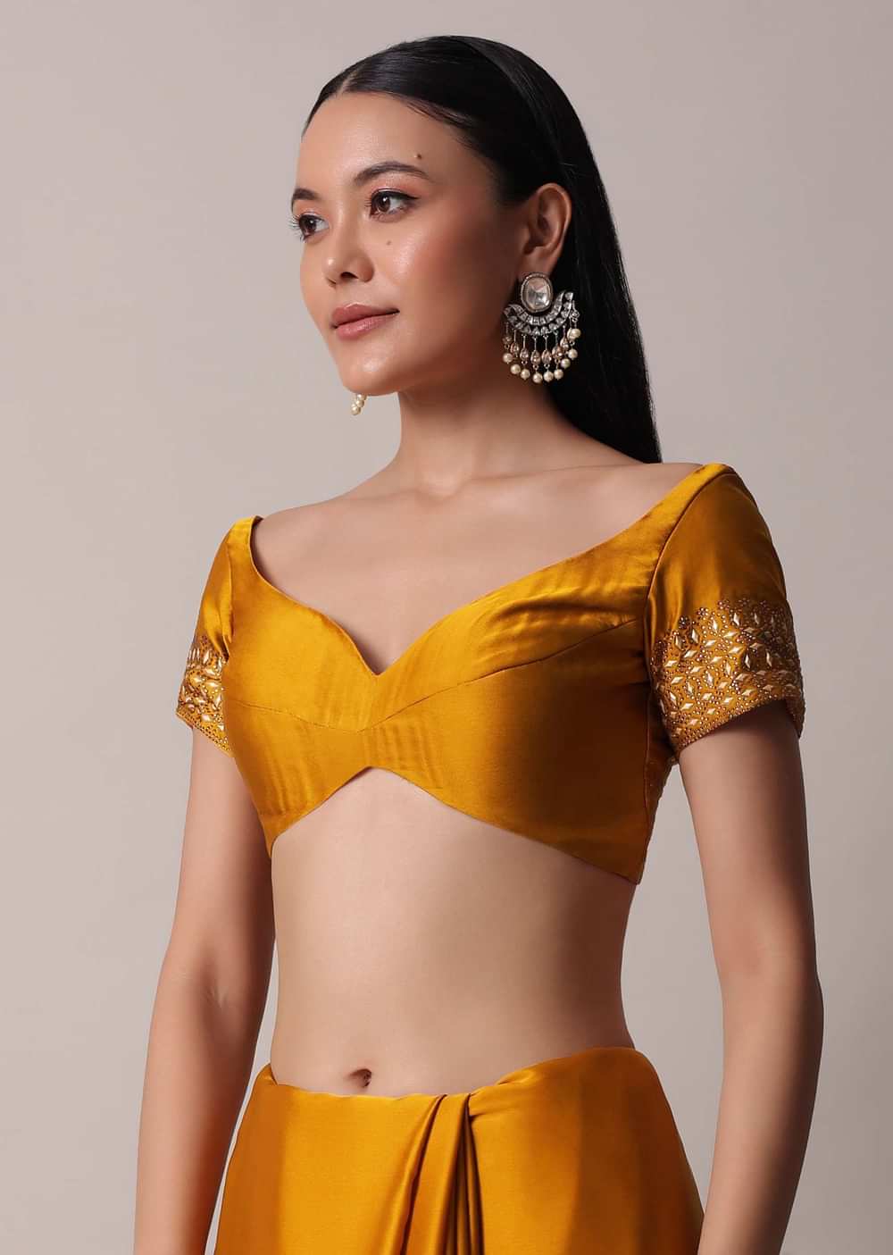 Mustard Satin Saree With Gold Tone Embellishments And Unstitched Blouse Piece