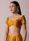 Mustard Satin Saree With Gold Tone Embellishments And Unstitched Blouse Piece