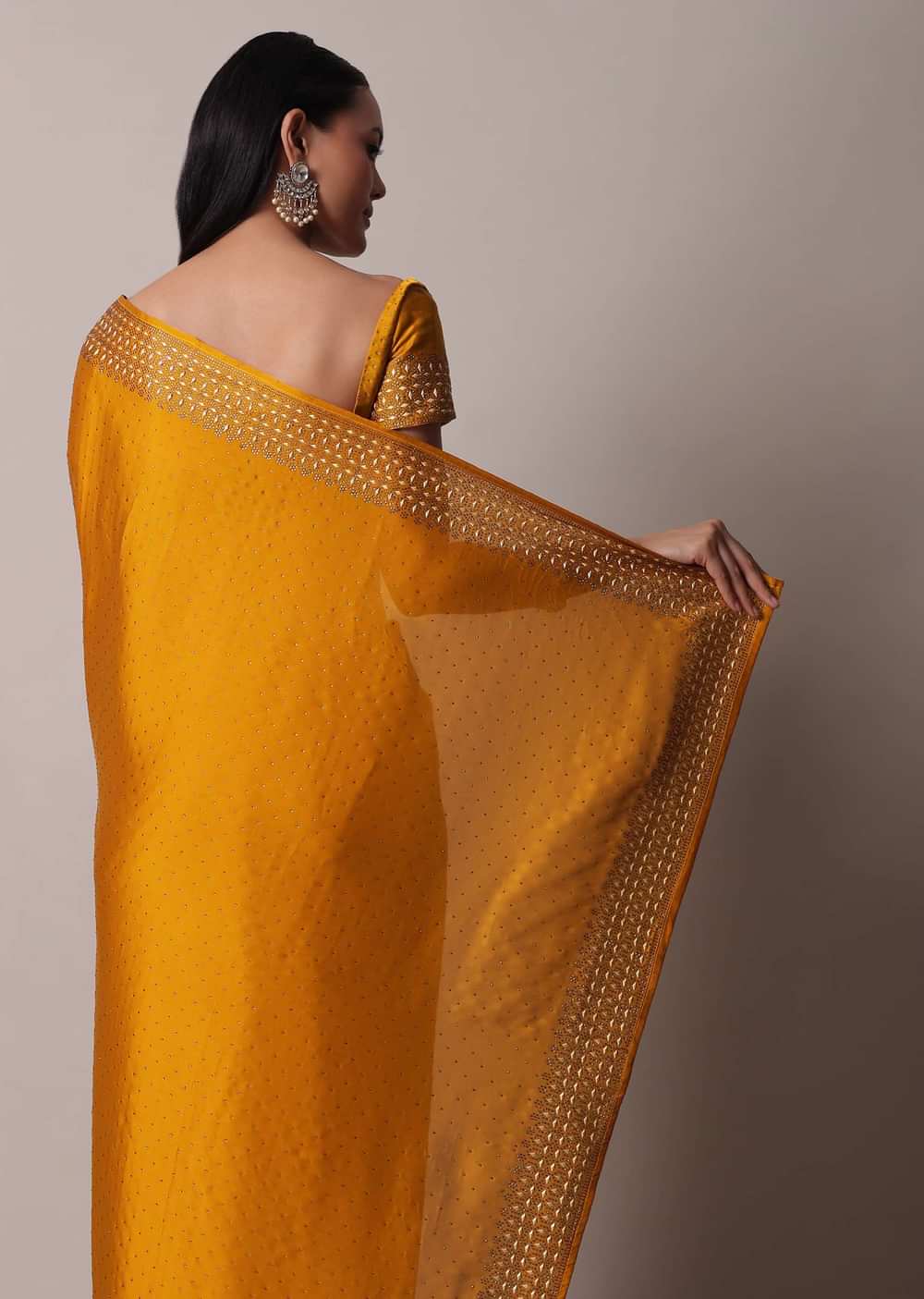 Mustard Satin Saree With Gold Tone Embellishments And Unstitched Blouse Piece