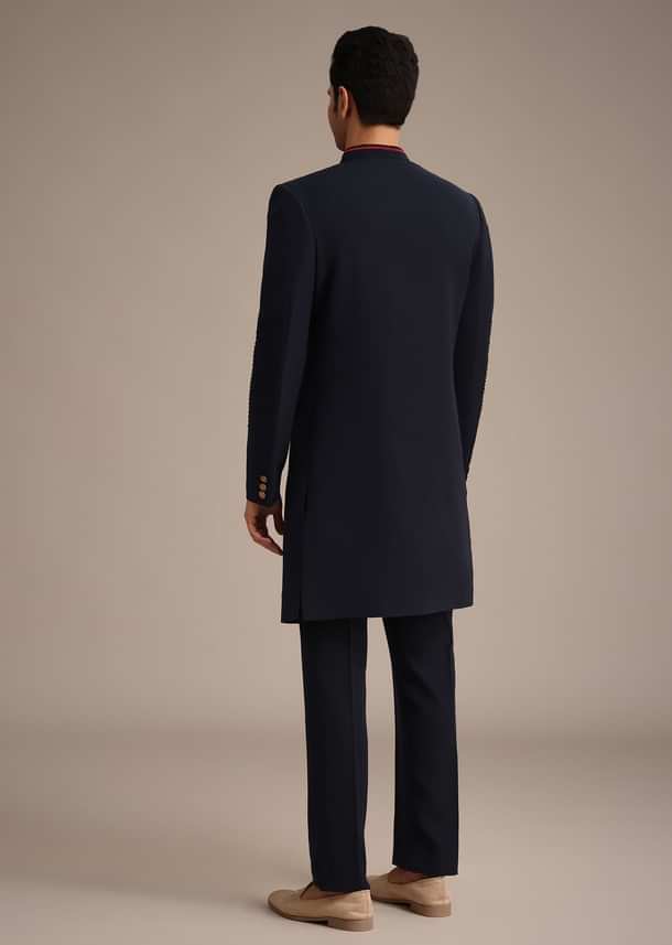 Navy Blue Indowestern Set With Animal Motif Brooch Navy Blue Indowestern Set With Animal Motif Brooch