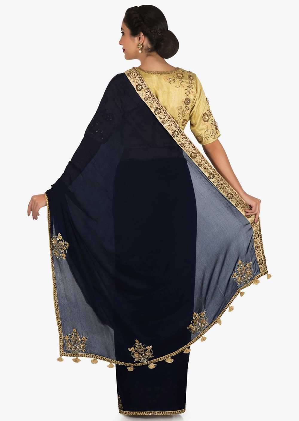 Navy blue saree in satin silk with a beige blouse embroidered with zardosi and sequin work only on Kalki
