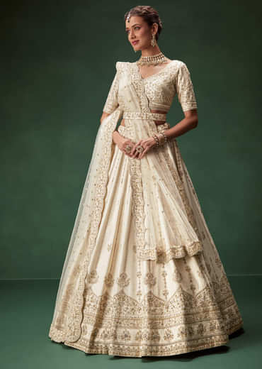 Off White Bridal Lehenga Set With Boat Neck Blouse And Regal Zari Work