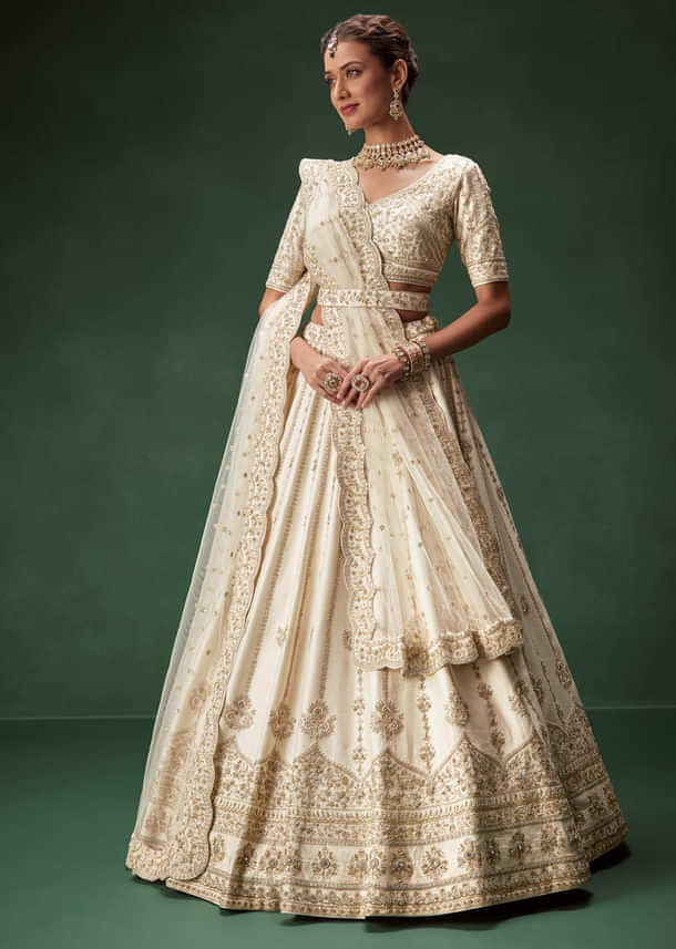 Off White Bridal Lehenga Set With Boat Neck Blouse And Regal Zari Work