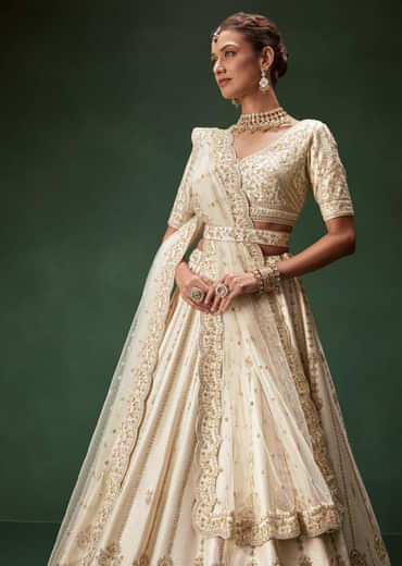 Off White Bridal Lehenga Set With Boat Neck Blouse And Regal Zari Work