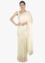Off white half and half saree in chiffon and net saree with embellished scallop border 