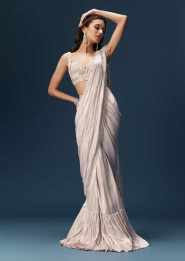 Off White Saree With Embroidered Blouse
