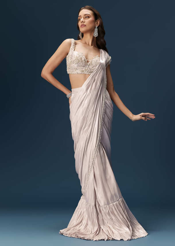 Off White Saree With Embroidered Blouse