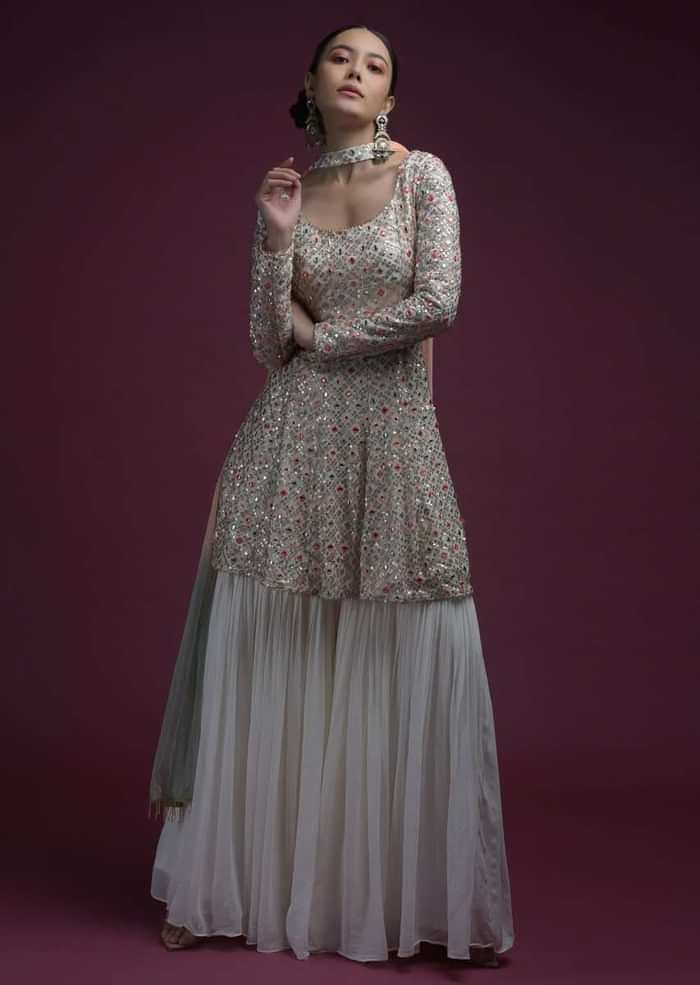 Off White Sharara Suit In Georgette With Peplum Kurti Adorned In Colorful Resham And Mirror Abla Jaal