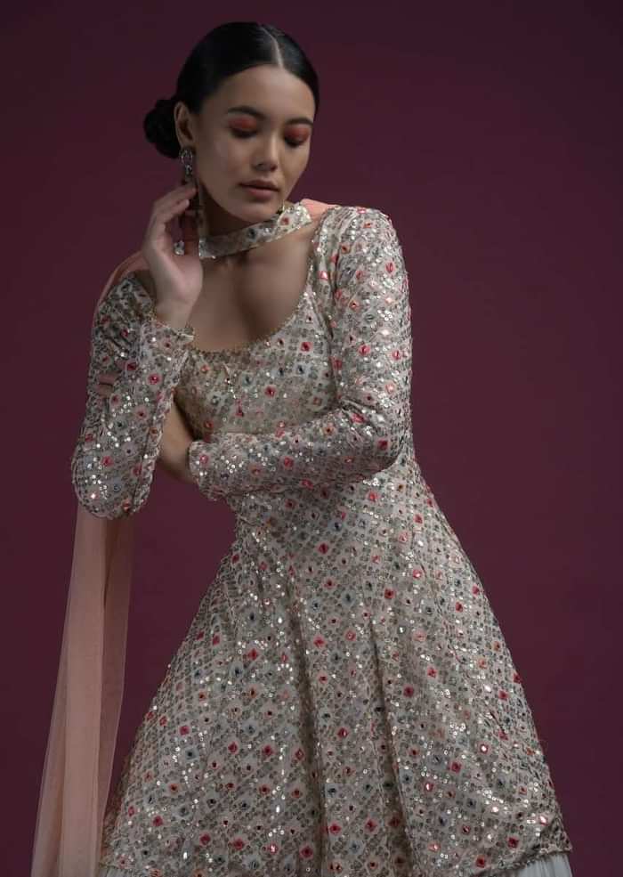 Off White Sharara Suit In Georgette With Peplum Kurti Adorned In Colorful Resham And Mirror Abla Jaal