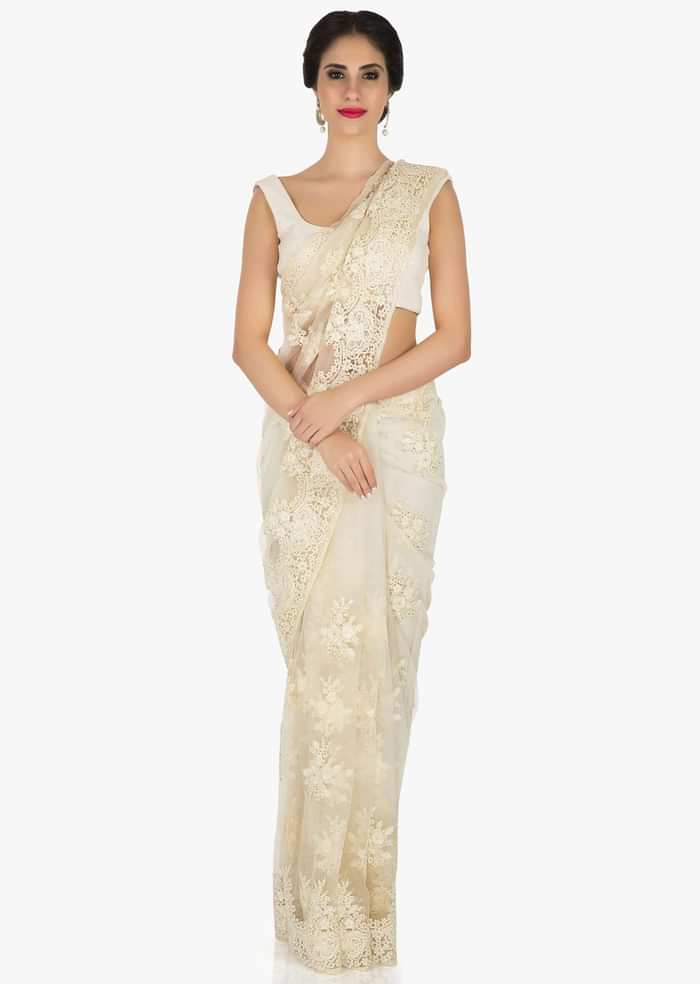 Off-white saree in net crafted in pretty thread work only on Kalki