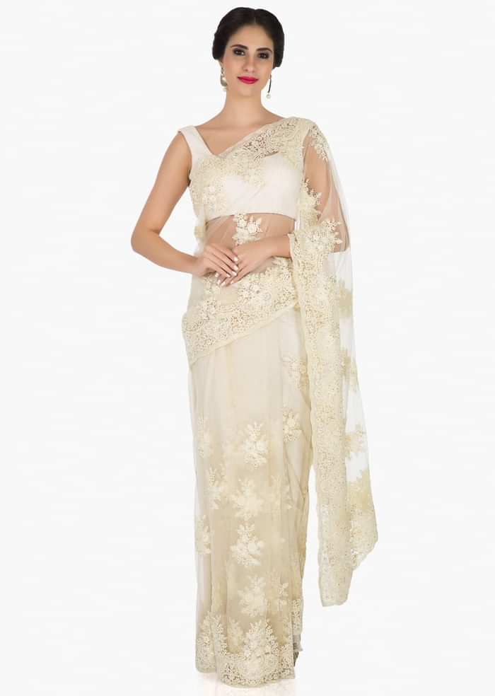 Off-white saree in net crafted in pretty thread work only on Kalki