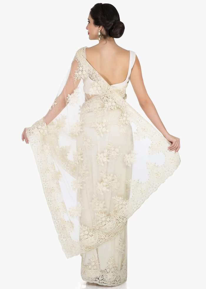 Off-white saree in net crafted in pretty thread work only on Kalki