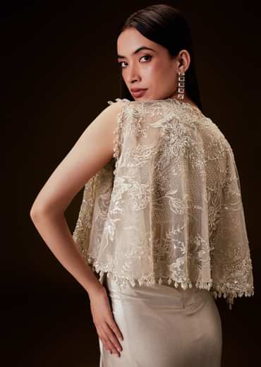 Off White Corset Gown With Sheer Waistline And Embroidered Cape