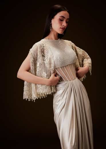 Off White Corset Gown With Sheer Waistline And Embroidered Cape