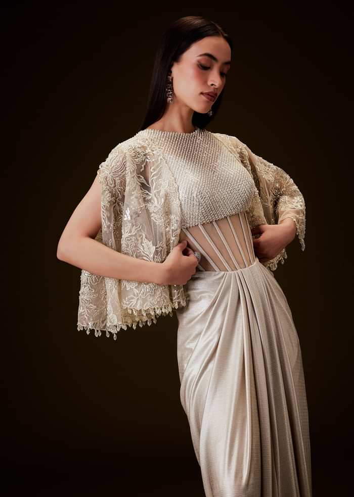 Off White Corset Gown With Sheer Waistline And Embroidered Cape