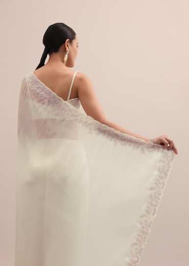Off White Organza Saree In Thread Work With Unstitched Blouse