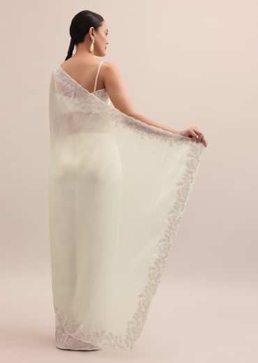 Off White Organza Saree In Thread Work With Unstitched Blouse