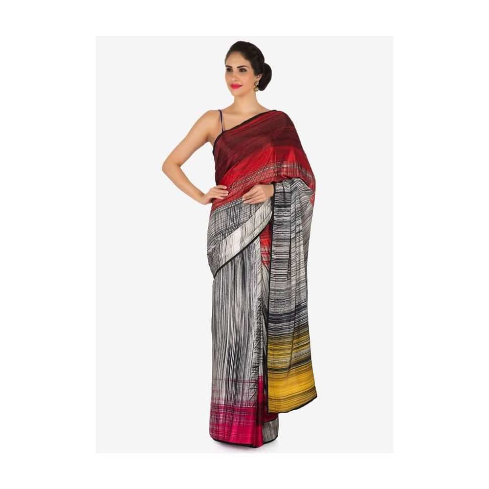 Off white, red and yellow shaded saree in print and kundan work only on Kalki