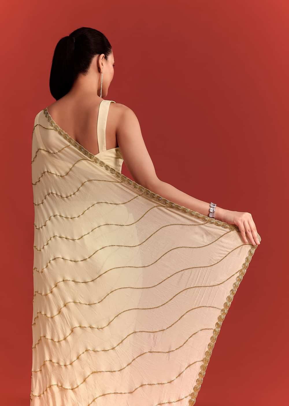 Off White Saree In Chinnon With Cutdana Embroidery