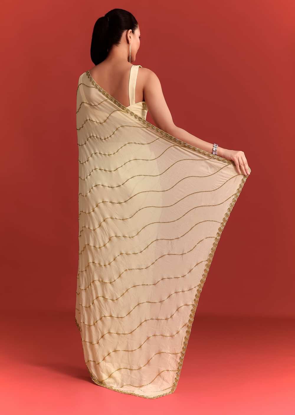 Off White Saree In Chinnon With Cutdana Embroidery