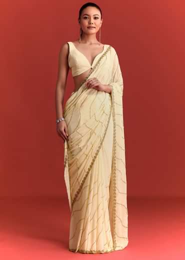 Off White Saree In Chinnon With Cutdana Embroidery