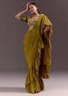 Olive Green Velvet Saree With Frilled Pallu And Heavy Embroidered Blouse