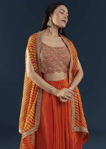 Orange Asymmetric Crop Top Skirt Set with Leheriya Cape