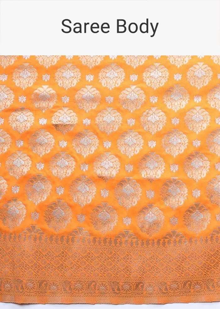Orange art handloom Saree In Silk With Weaved Floral Buttis