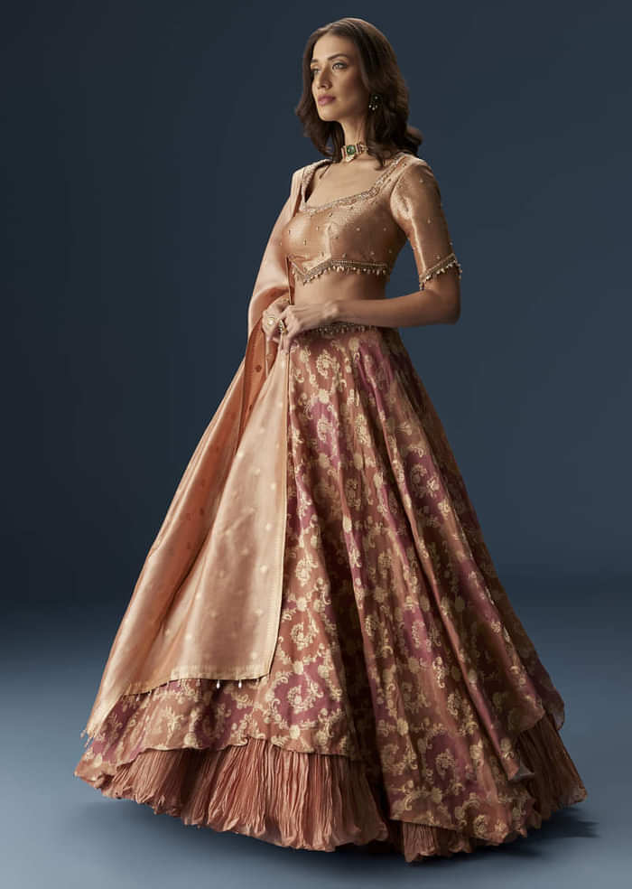 Orange Embroidered Blouse With Ruching Lehenga And Tassel Dupatta