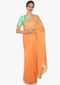 Orange crepe saree showcasing the thread gotta butti work only on Kalki