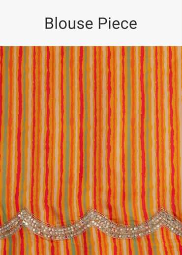 Orange Muslin Saree With Kaleidoscope Prints And Unstitched Blouse Piece