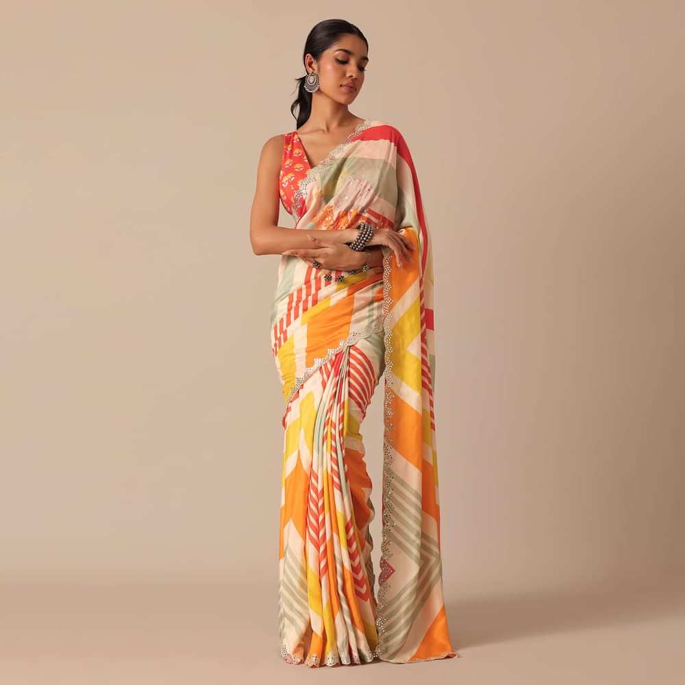 Orange Muslin Saree With Mirror Scallop Border And Unstitched Blouse Fabric