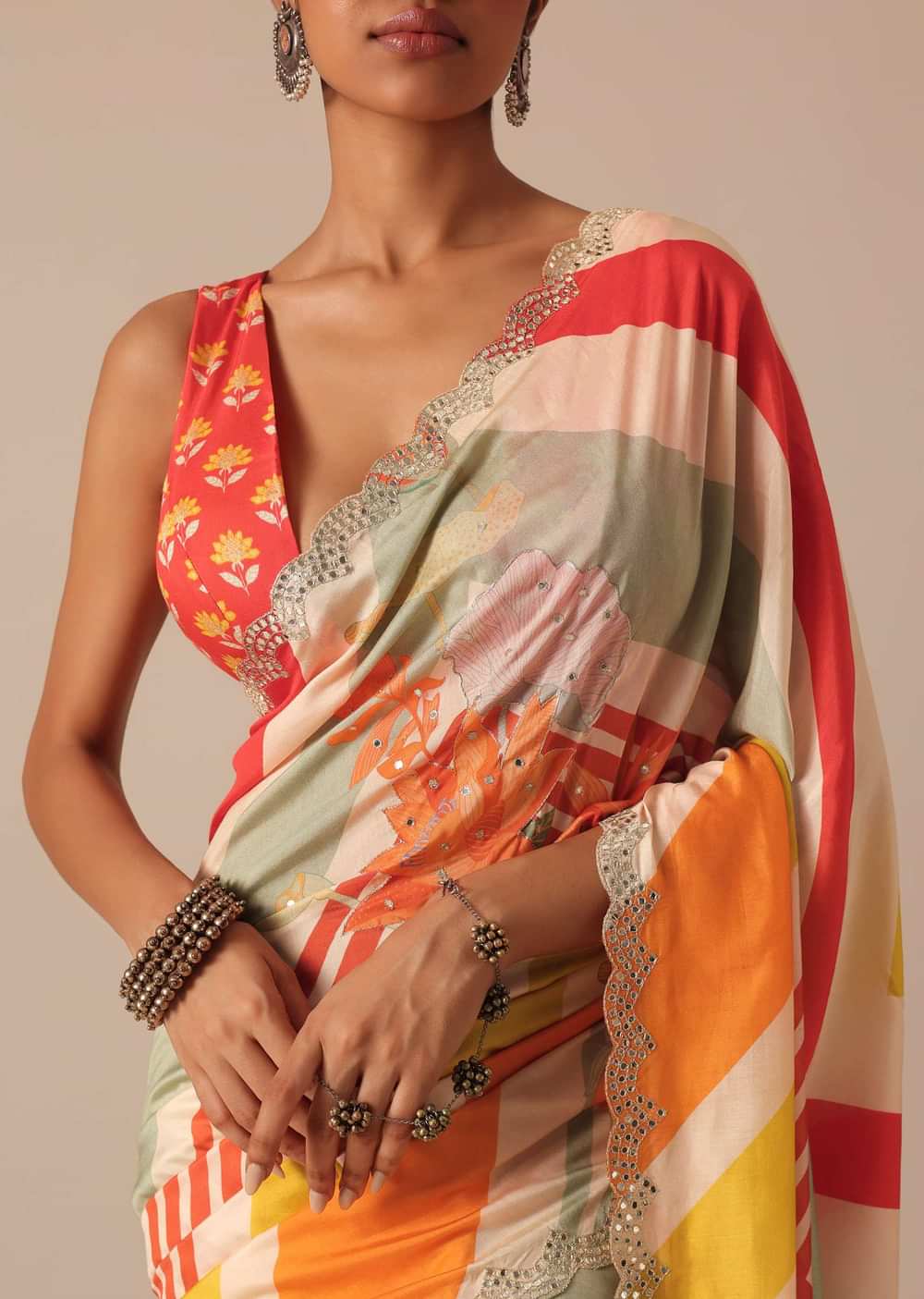 Orange Muslin Saree With Mirror Scallop Border And Unstitched Blouse Fabric