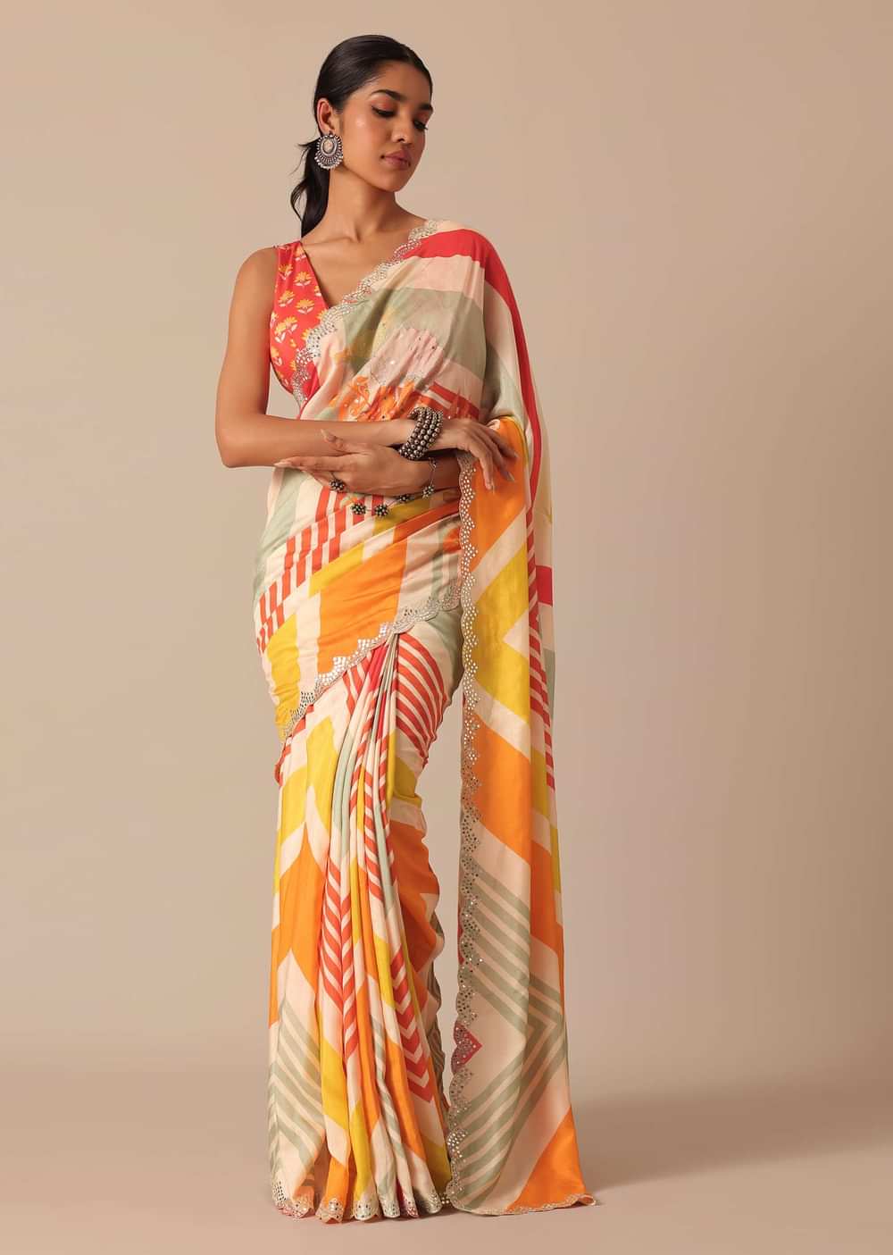 Orange Muslin Saree With Mirror Scallop Border And Unstitched Blouse Fabric