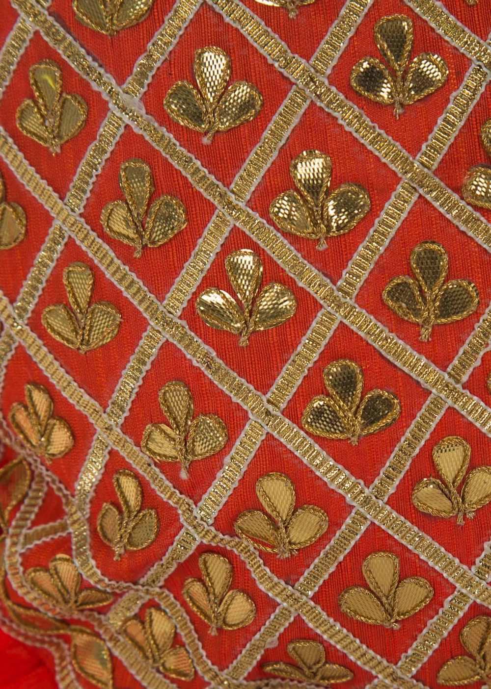 Orange potli bag beautified in gotta patti embroidered work only on Kalki