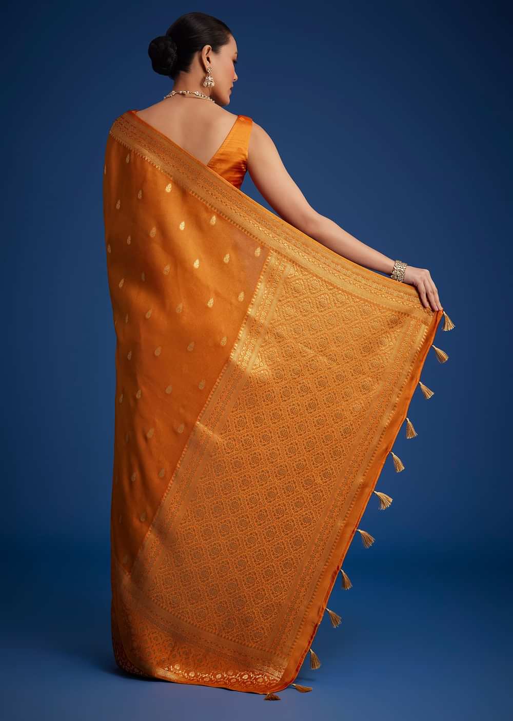 Orange Tissue Silk Saree With Zari Border And Butti Work
